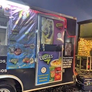 a food truck decorated for christmas