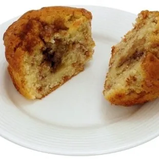 a half eaten muffin on a plate
