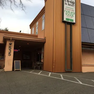 Entrance is facing the parking lot. The lot is shared with the self serve car wash.