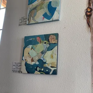 Paintings on display. Can be bought at reasonable prices.