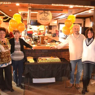 a group of people posing for a picture