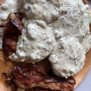 Biscuits and gravy with bacon, I had to have a bite before the picture. Oops, sorry.