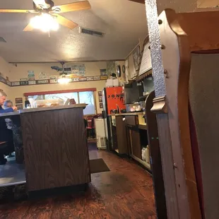 a view of the kitchen from the dining room