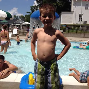 Baby pool in background.