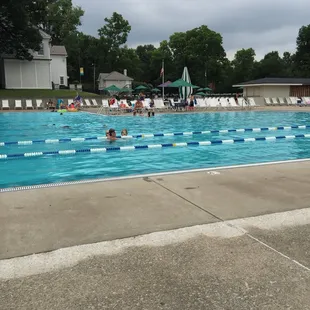 Main pool in the foreground. Adult pool in the background beyond the flag pole