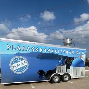 a food truck parked in a parking lot