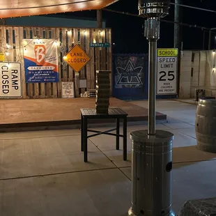 There are four large heaters outside and it looks like you can turn on one of the time.