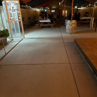 Floor is concrete but looks like there's plenty of room to dance.