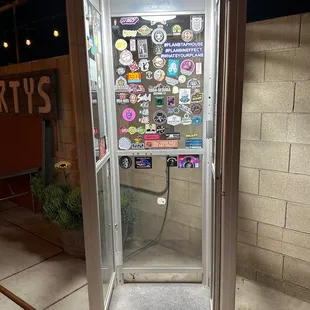 This is an old phone booth that you can go in and close the door to make or take a phone call on your cell phone. What a great idea!