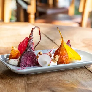 Roasted beets, goat cheese mousse, pistachios.