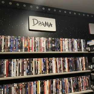 a shelf full of dvds