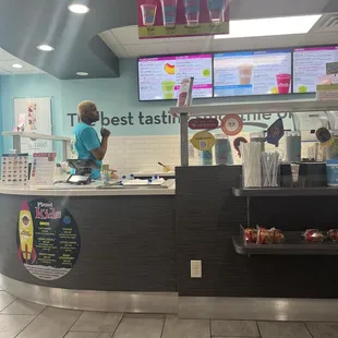 a woman ordering at the counter