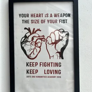 a picture of a heart and a fist