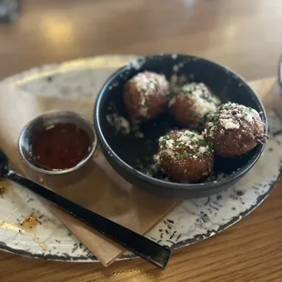 Beignet style hush puppies with jalapeño jam.