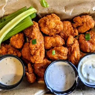buffalo wings, celery, and ranch dressing