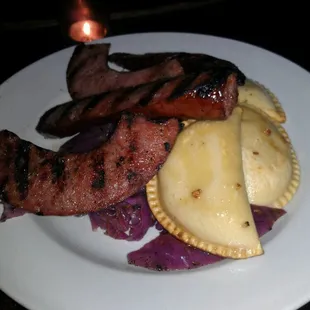 Local Kielbasa with Ohio City Pierogies and braised red cabbage.