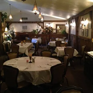 a dining room with tables and chairs