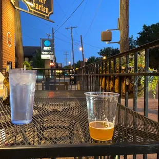 a glass of beer on a table