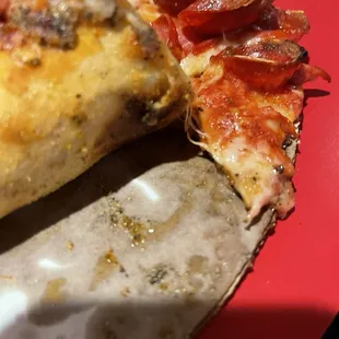 Rubbery burnt pizza crust oily bottom