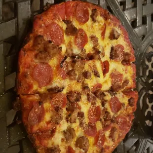 Baby pizza that they make you order if you are by yourself.