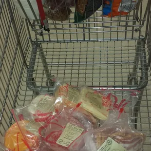 a shopping cart full of groceries
