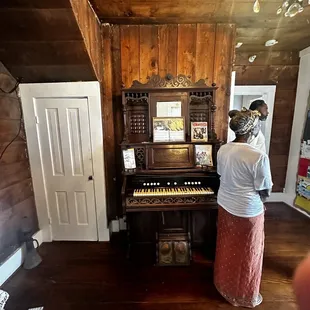 An exhibit with a donated piano