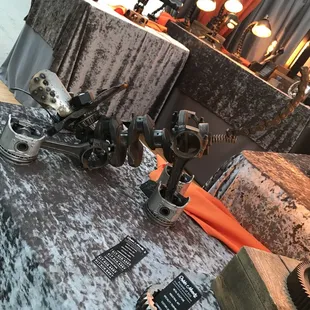 Artist makes lights from metal parts like hub caps and chains.