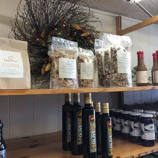a shelf of food and wine