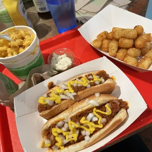 Two vegan coneys, vegan Mac and cheese, tots