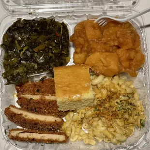 Greens, fried chicken, mac and cheese, candied yams, and cornbread.