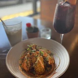 Elote Fried "Ribs" backed by horchata &amp; sangria.