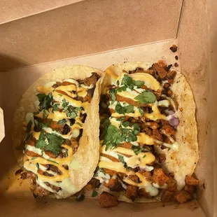 Carnitas taco and pastor taco