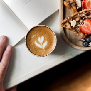 Cappuccino and Croffles while reading a poetry book is the perfect afternoon delight.
