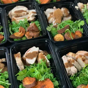 a variety of food in plastic containers