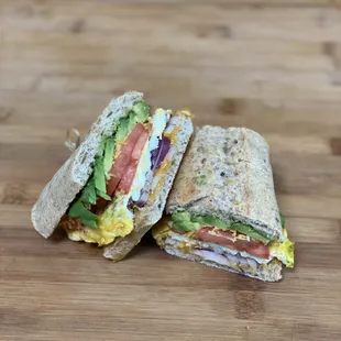 Breakfast Sandwich with extra avocado, red onions  and tomatoes !