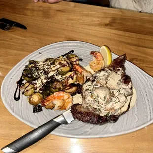 a plate of food on a wooden table