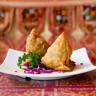a plate of fried food on a table
