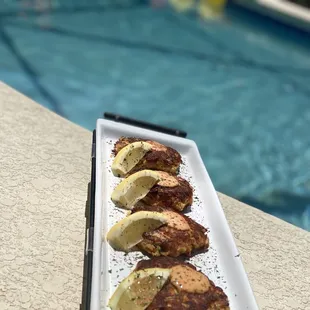 Crab Cakes served poolside..
