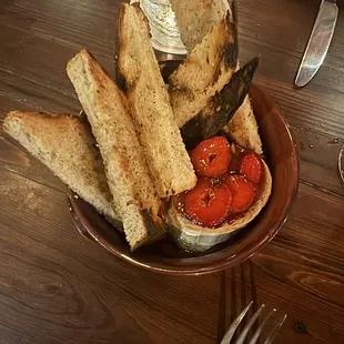 Baked goat cheese with strawberry agrodolce and bread