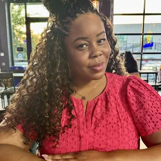 Asha E.