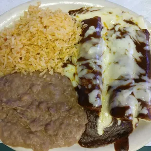 Mole enchiladas with rice and beans. Very good.