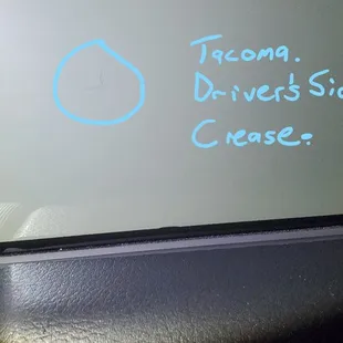 Toyota Tacoma Driver&apos;s Window. Crease in the film.