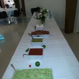 a long table with food on it