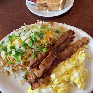 Fantastic breakfast special.  Added onion, green peppers and cheese to hash browns.