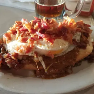They&apos;ll fix whatever you ask for, this is what I call the T-Dog, hot dog split and fried with loose Burger chili fried egg bacon and onions