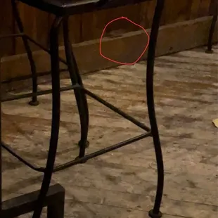 Mouse entering walls to interior of restaurant.