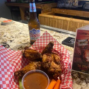 Wings with sauce on the side, mango habanero, Nashville, hot and buffalo. Love them all.