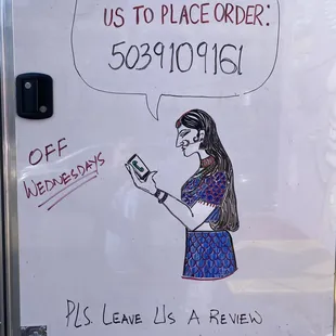 a woman holding a cell phone