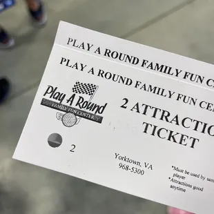2 attraction ticket; can be used for 2 rounds of golf or 1 laser tag, 1 golf etc.