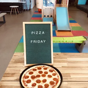 $8.99 pizzas every Friday!